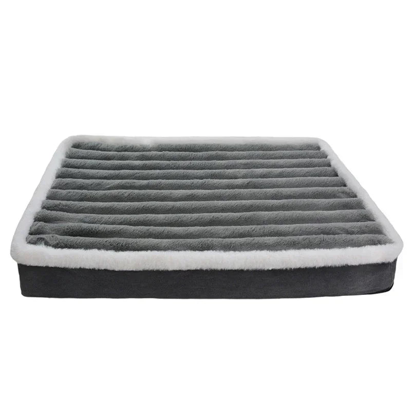 Dog crate bed in grey: a flat rectangular pad with ribbed grey plush, a white fleece edge and a grey base