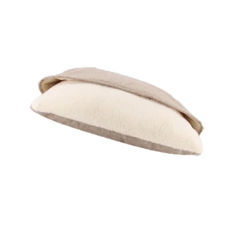 Bed cave for dogs in brown linen look fabric, a flat pillow with a cream sherpa lining under the top flap