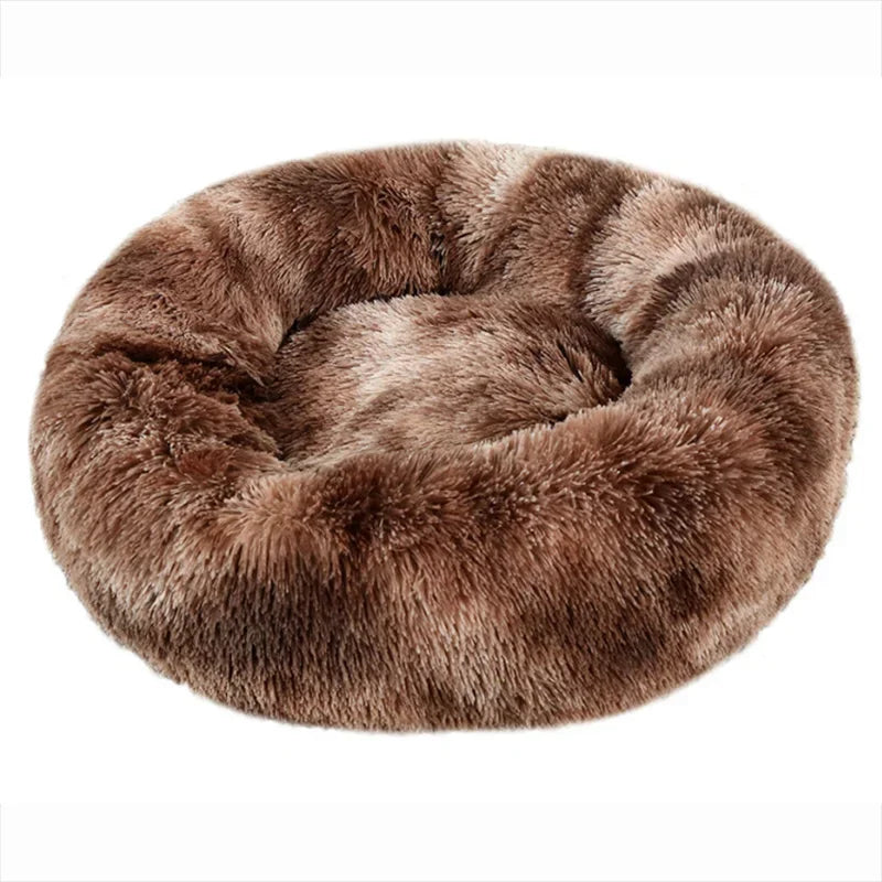 Calming dog bed in brown tie-dye long plush, a round donut shape with a high padded rim