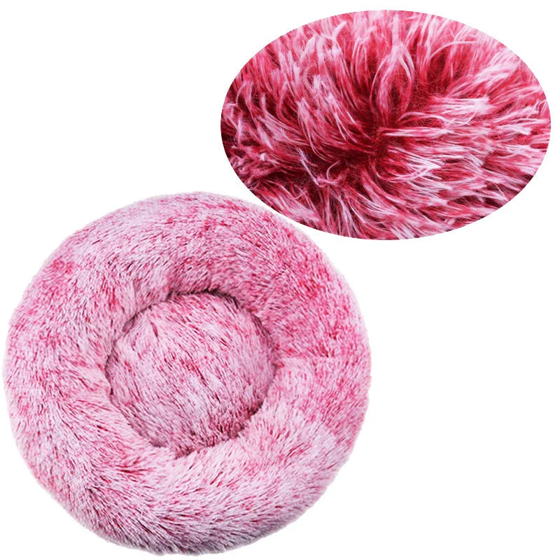 Donut dog bed in frosted raspberry plush, with an inset close-up of the deep red roots and pale tips