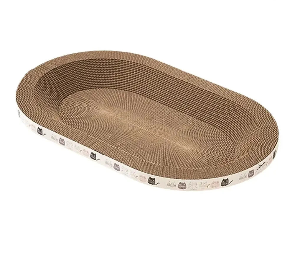 Cardboard cat scratcher bed in an oval bowl shape of corrugated card, edged with a white band of cartoon cats