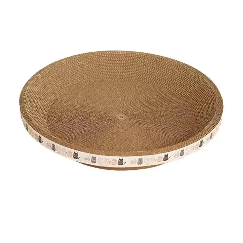 Cardboard cat scratcher bed in a round bowl shape, made of coiled corrugated card with a white band of cartoon cats