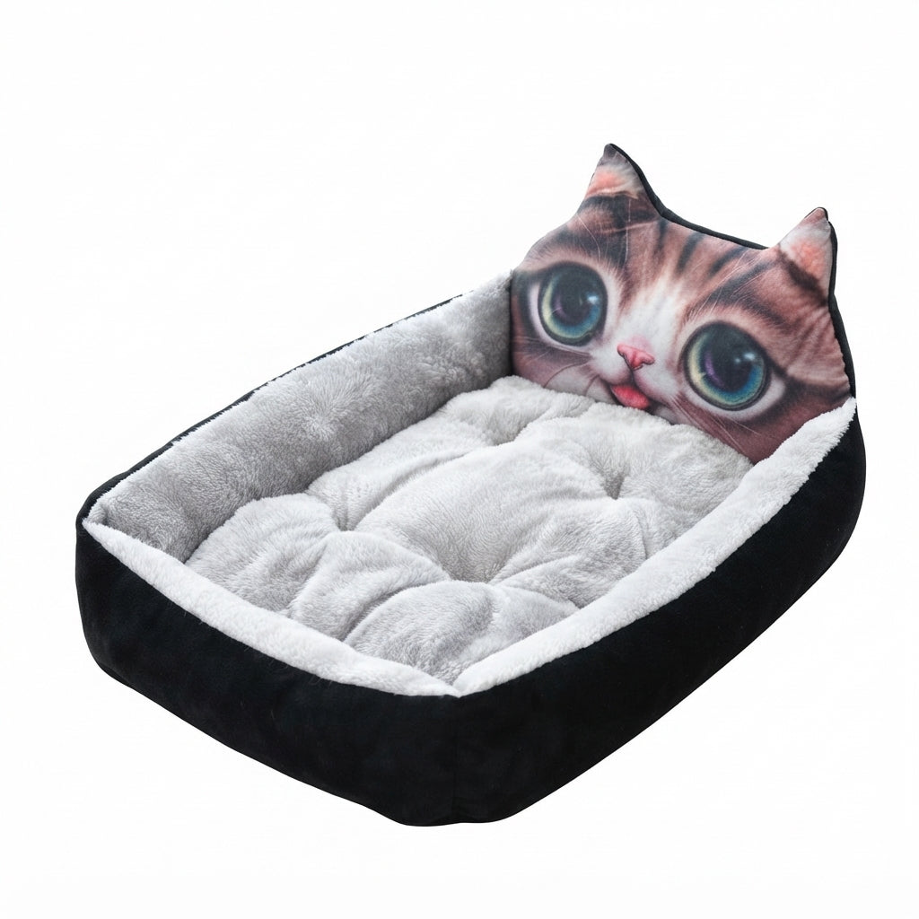 Cartoon pet bed with a printed big-eyed tabby kitten face, black sides and a light grey tufted cushion
