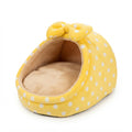 Covered cat bed with a bow in yellow dots: yellow plush with white spots and a beige plush cushion inside