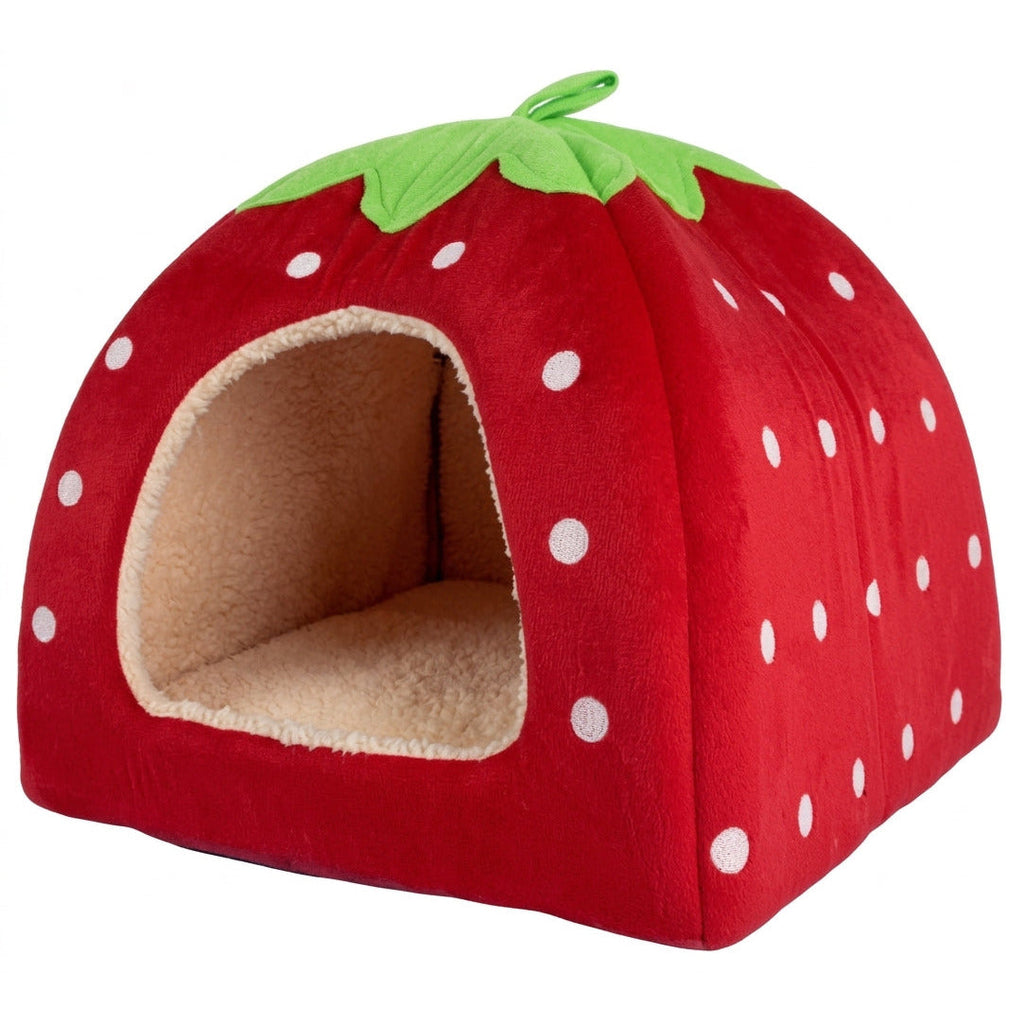Cat cave bed shaped like a red strawberry with white dots, a green leaf top and a cream fleece lining