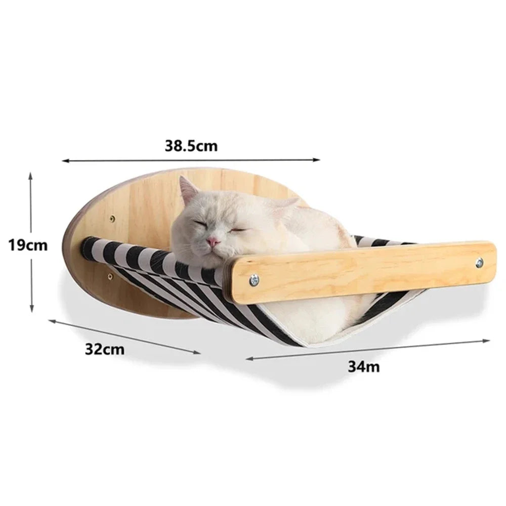 Wall hammock in black and white striped fabric on a pine frame, 38.5 x 32 cm and 19 cm high, a white cat asleep in it