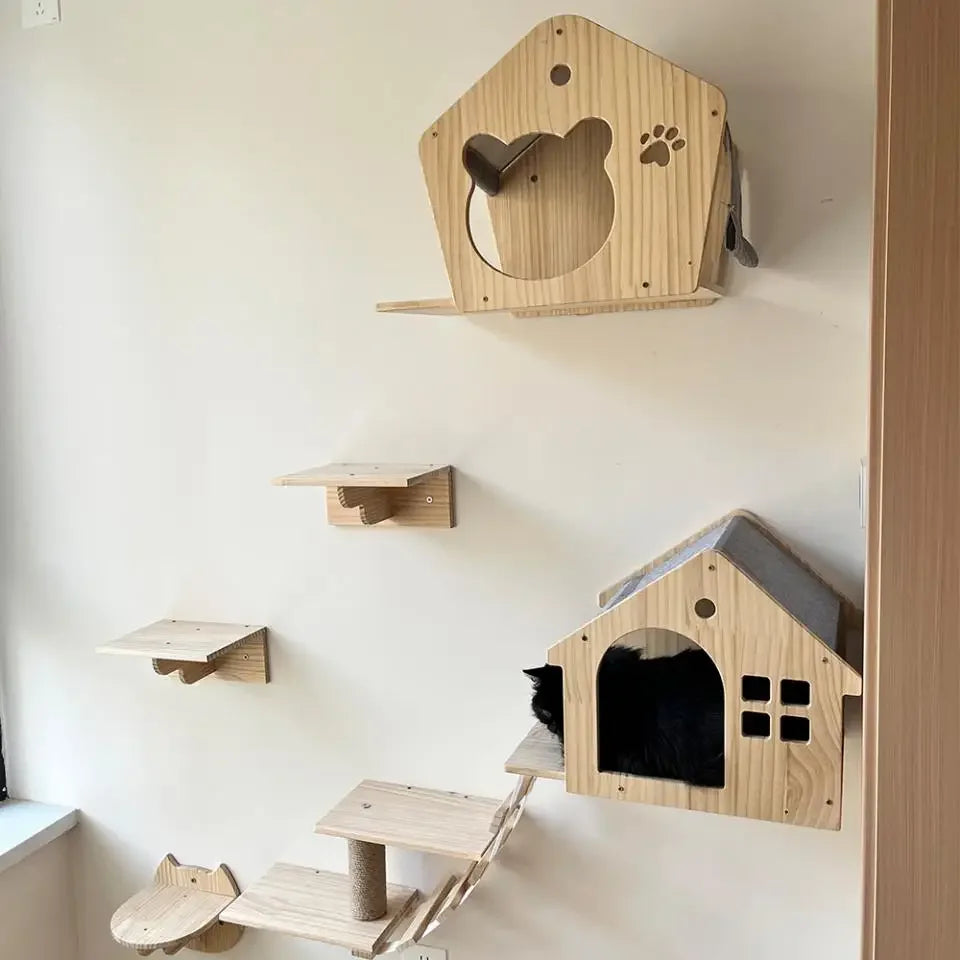 Pine cat tree house wall set: a bear-door house, a window house with a grey roof, steps and a post, a black cat inside