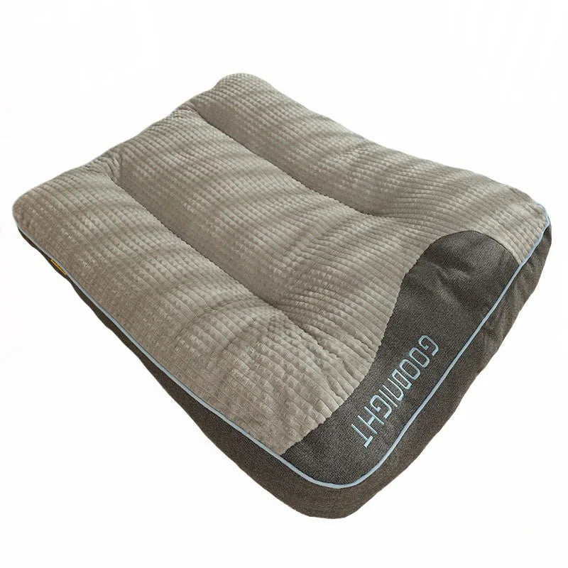 Dog bed for extra large dogs in grey-brown: a thick pillow top, a raised head end and GOODNIGHT stitched on the side