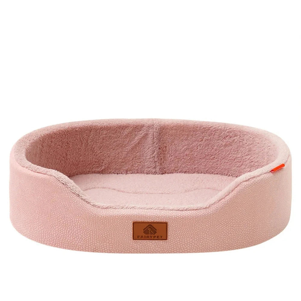 Dog bed for large dogs in pink, an oval basket with a pebble-textured outer shell and a soft plush lining