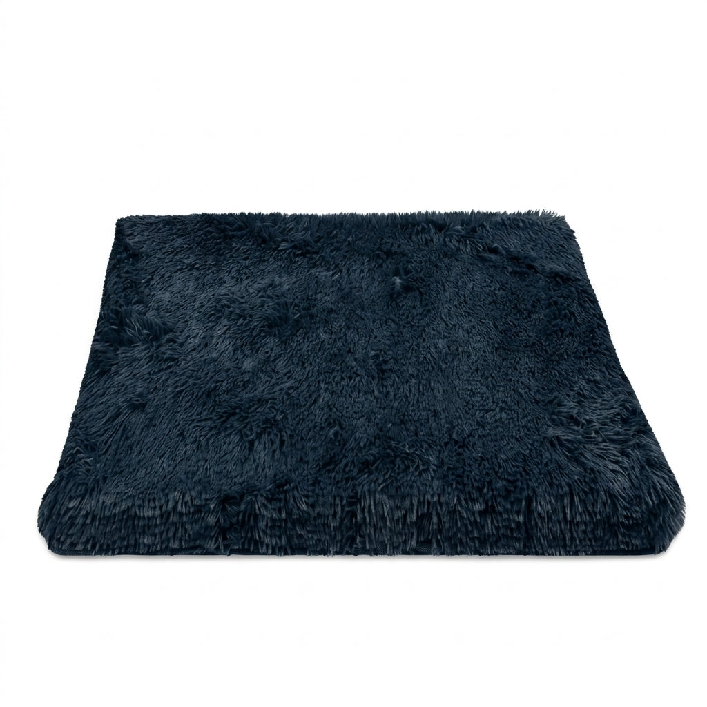 Dog bed mattress in very dark navy long plush, a thick rectangular pad on a white background