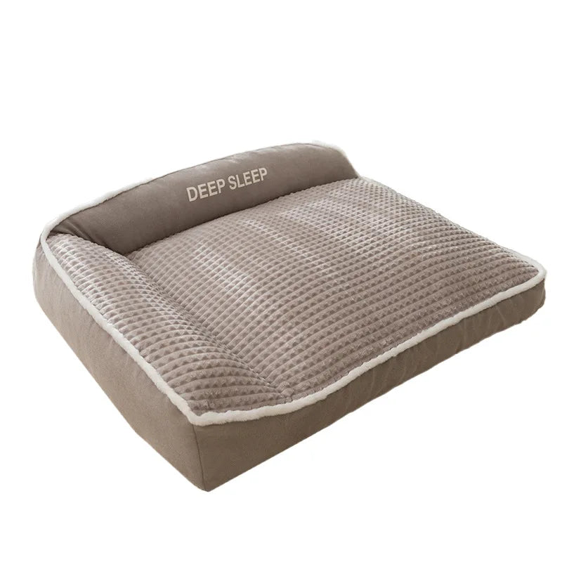 Dog bed with washable cover in grey, a sofa-style cushion with a raised back and side, 'Deep Sleep' on the backrest