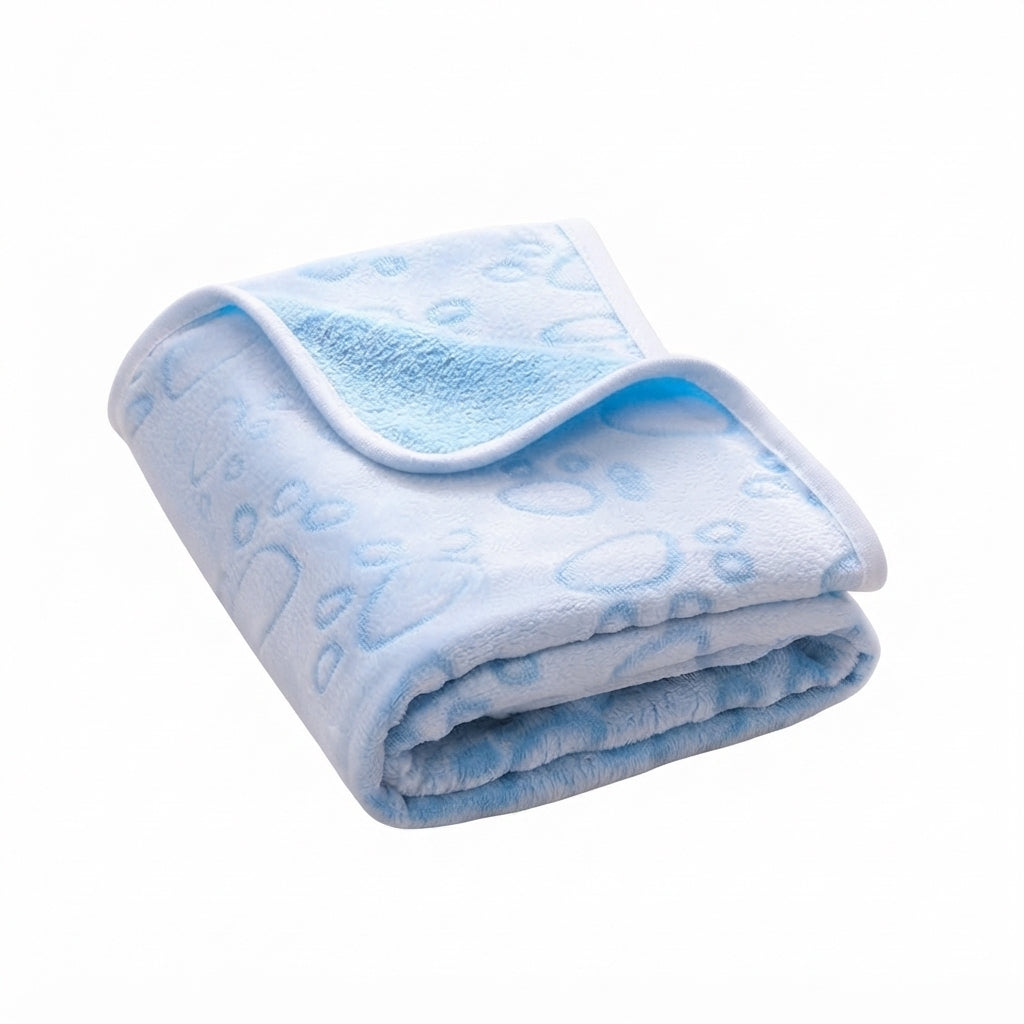 Folded pale blue fleece blanket with embossed outline paw prints and a white bound edge
