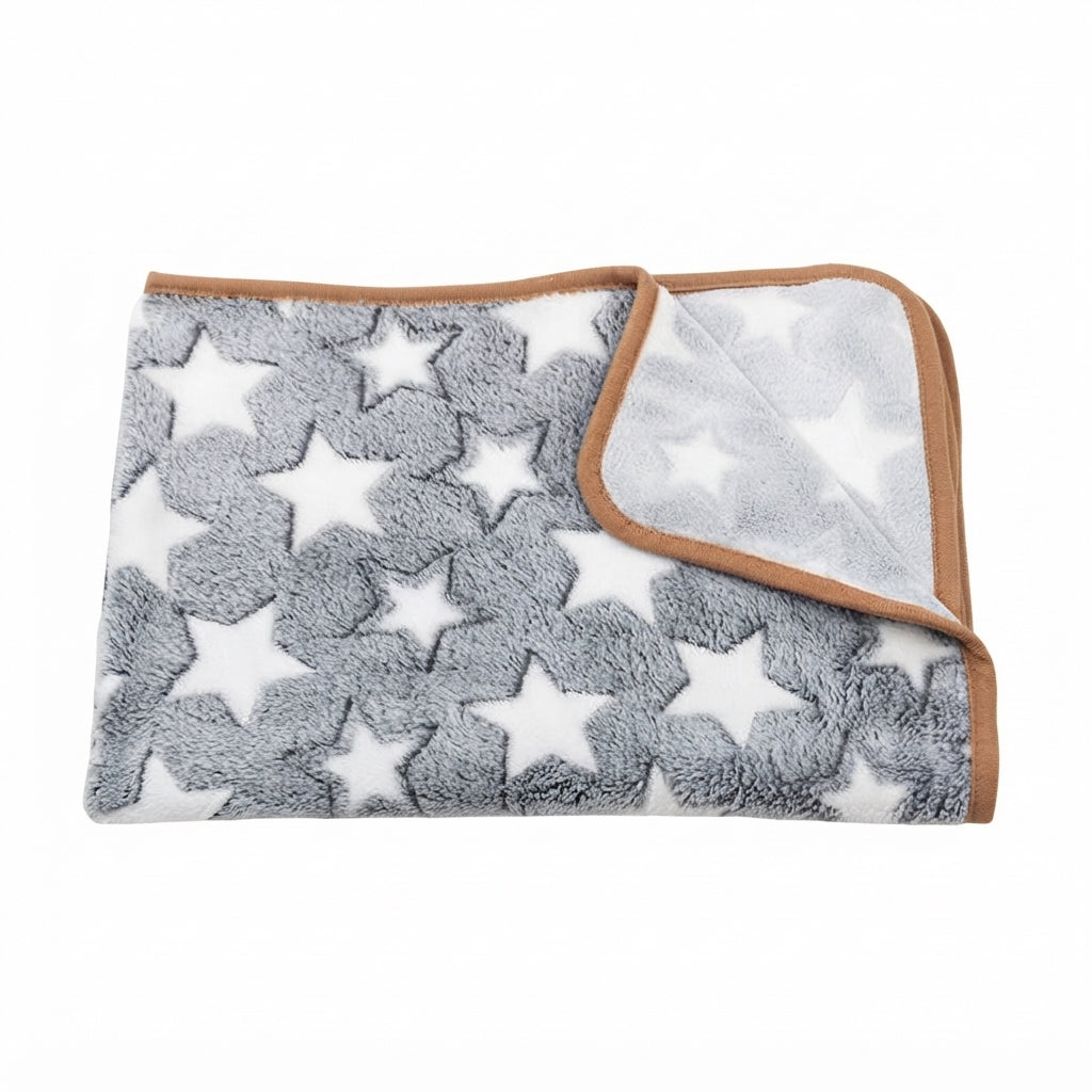 Folded grey coral fleece blanket with large white stars and a tan bound edge