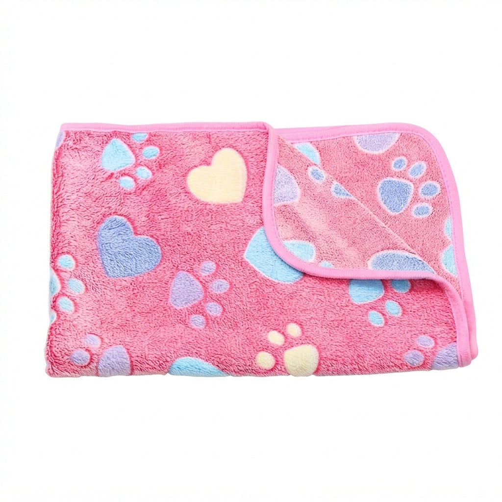 Folded rose red heart fleece blanket, deep pink with pastel hearts and paw prints and a pink edge