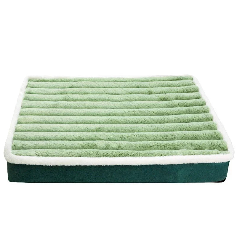 Dog crate bed in green: a flat pad with ribbed sage green plush, a white fleece edge and a dark green base