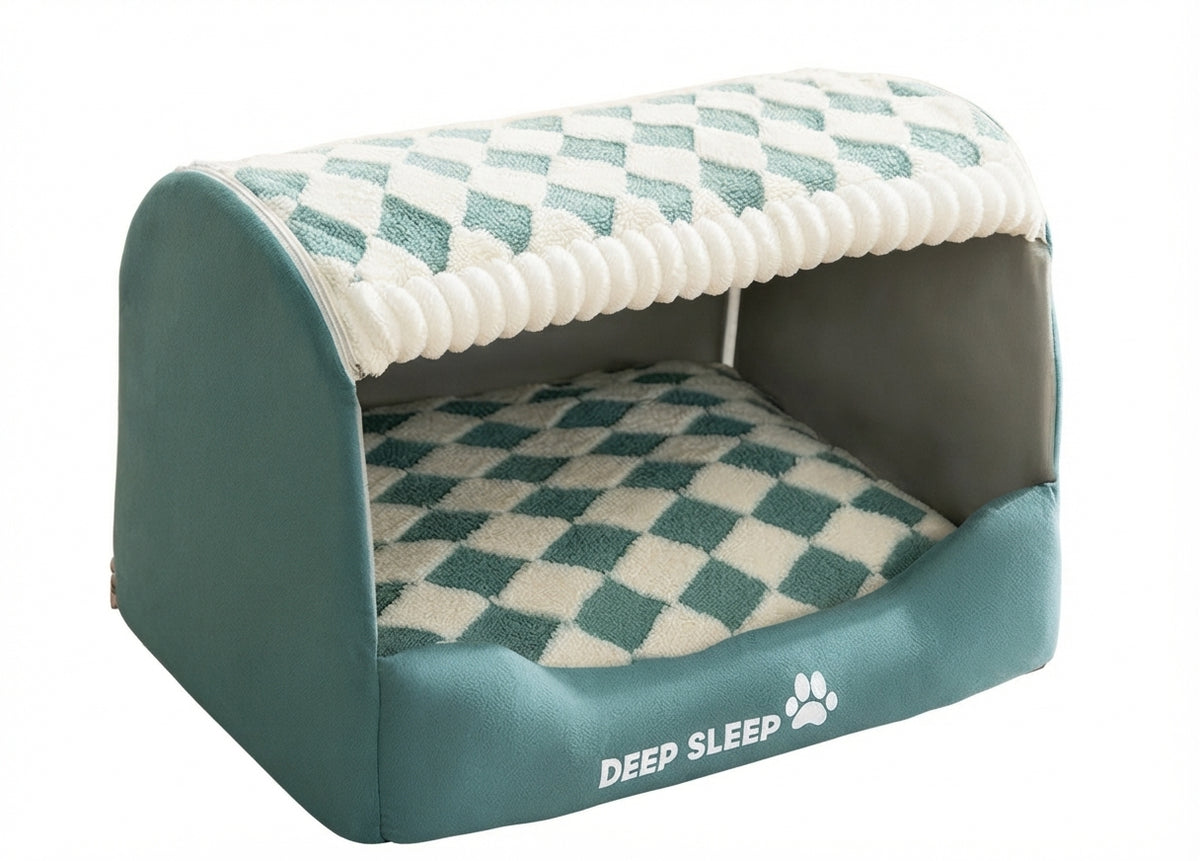 Semi-closed dog den bed in green with a green and cream checked roof and cushion, seen at an angle