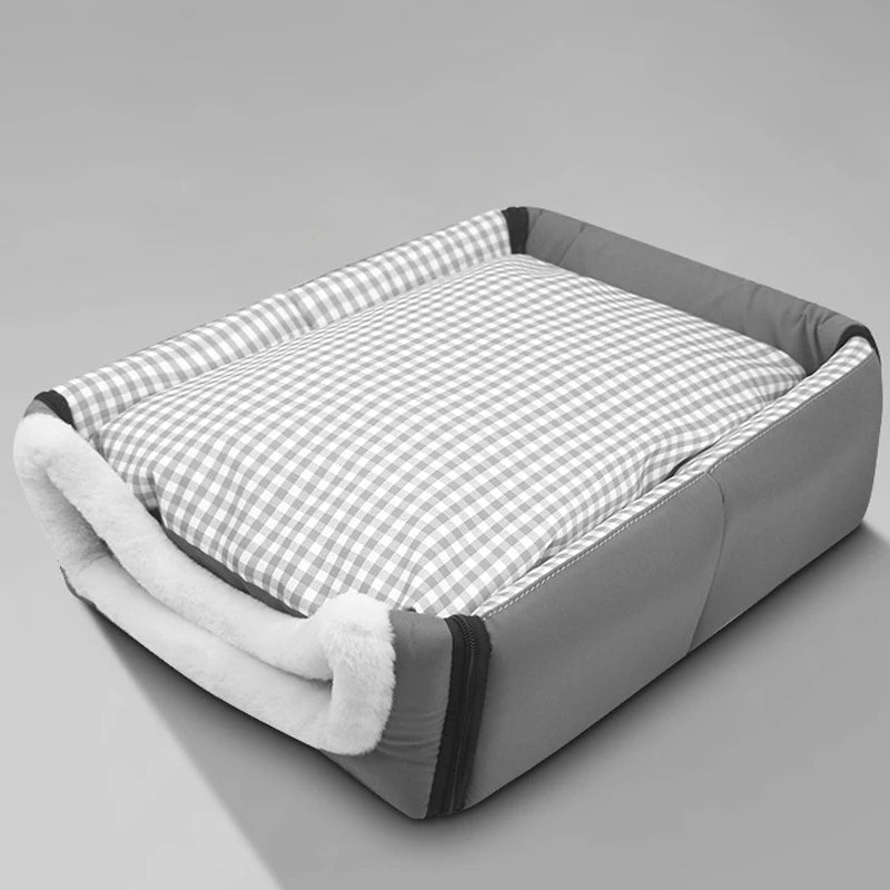 Grey gingham dog house bed with the roof unzipped and folded down, used as an open bed with a raised rim