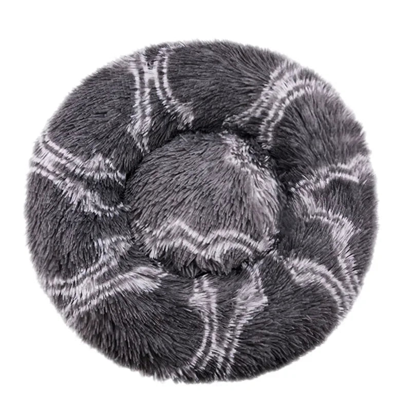 Round donut dog bed in charcoal swirl plush, dark grey with pale wavy lines, seen from above