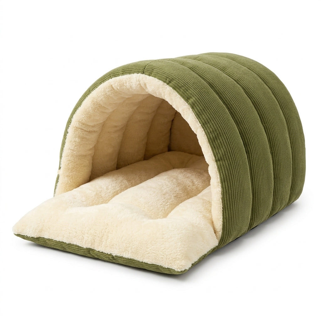 Enclosed dog bed in Bishan Green corduroy with padded ribbed panels and a cream fleece lining, front flap folded down