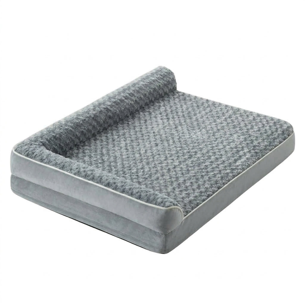 Extra large dog bed in grey, sofa style with a rose-textured plush top, a bolster headrest and a velvet base