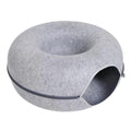 Felt donut cat bed in light grey with a dark zip and a tunnel opening in the side