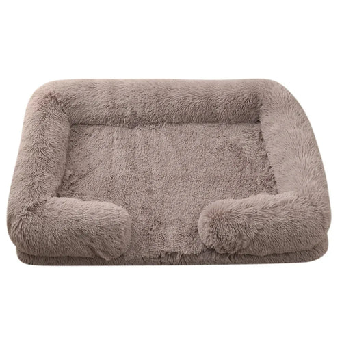Fluffy dog bed in brown shaggy plush, a rectangle with bolsters round the back and sides
