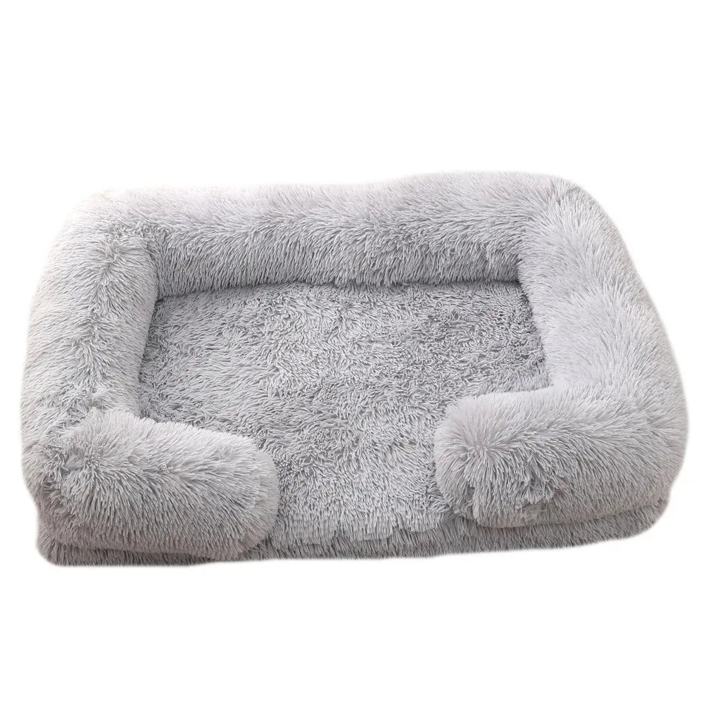Fluffy dog bed in pale grey shaggy plush with bolsters round the back and sides