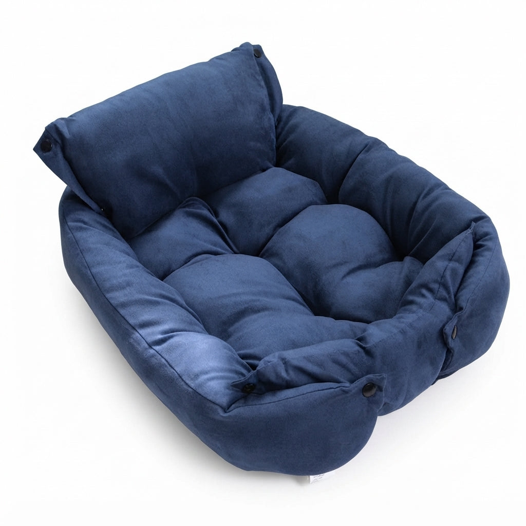 Foldable dog bed in blue suede-effect fabric, set up as a sofa with a buttoned backrest and a tufted seat