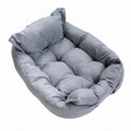 Foldable dog bed in grey suede-effect fabric, set up as a sofa with a buttoned backrest and a tufted seat