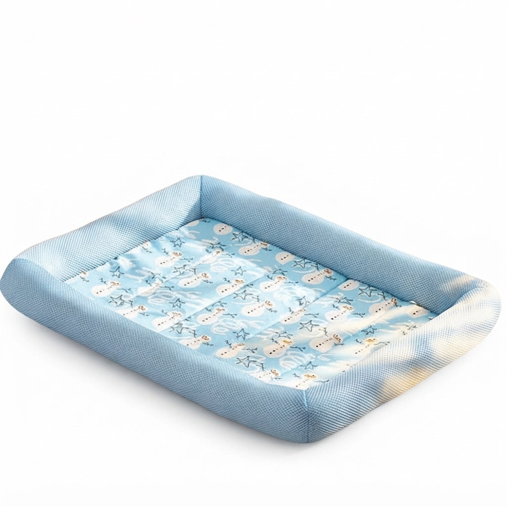 Ice silk cat cooling bed in blue: a rectangular mat printed with snowmen and stars, framed by raised mesh sides