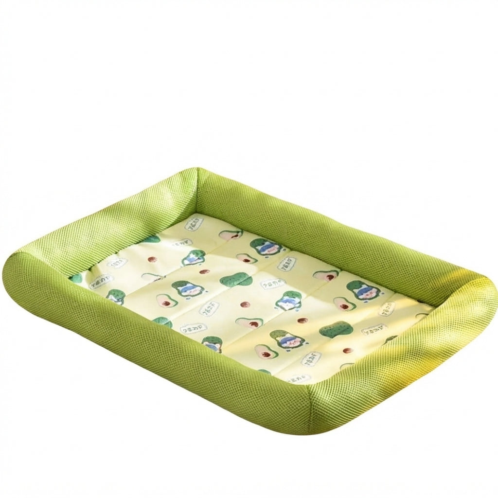 Ice silk cat cooling bed in green: lime mesh sides around a pale yellow mat printed with avocados