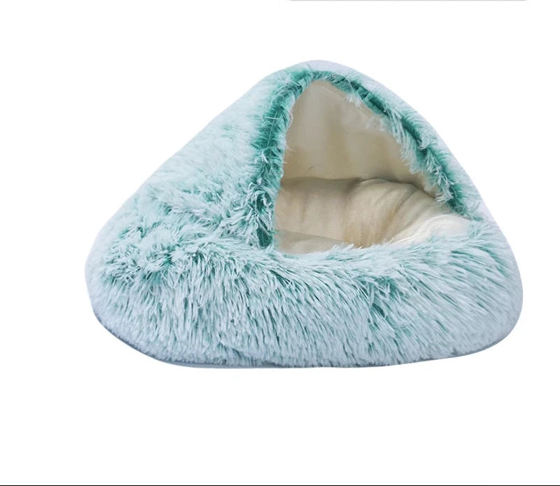Hooded igloo bed in green, short plush: shaggy mint green fur with white tips and a smooth cream lining inside