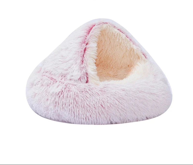 Hooded igloo bed in pink, long plush: shaggy white-tipped pink fur and a fluffy beige lining inside
