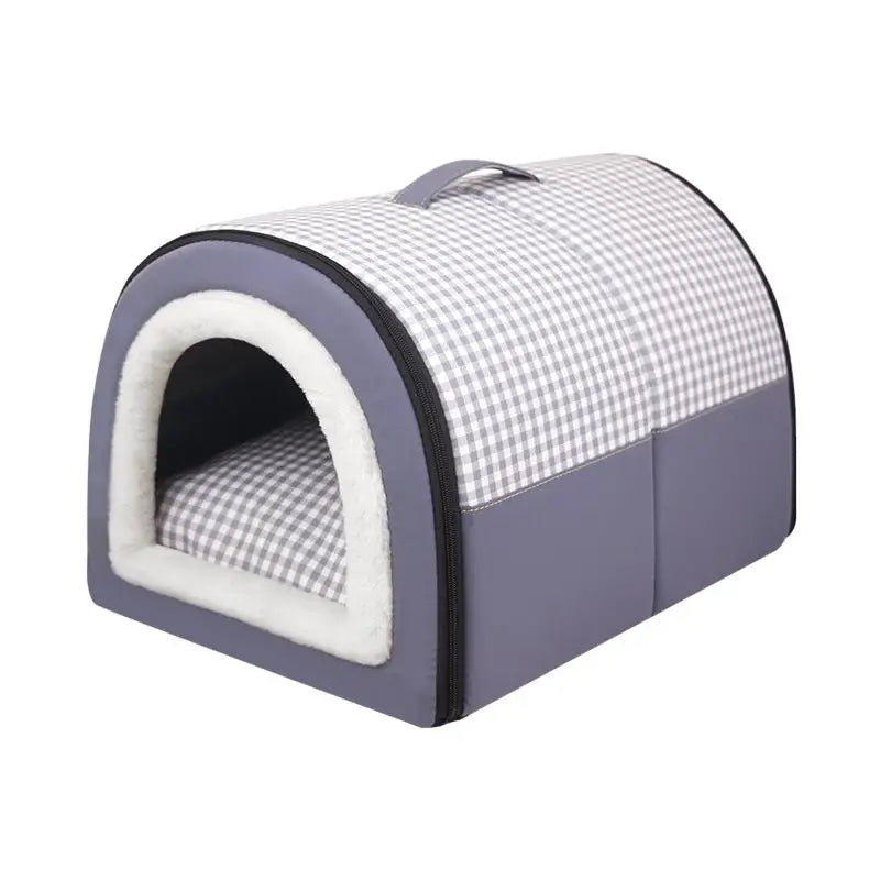 Indoor dog house bed in dark blue with a grey gingham roof, a white plush arched door and a carry handle