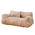 Luxury cat bed in camel plush shaped like a two-seater sofa, with rounded armrests, a split backrest and a small pillow