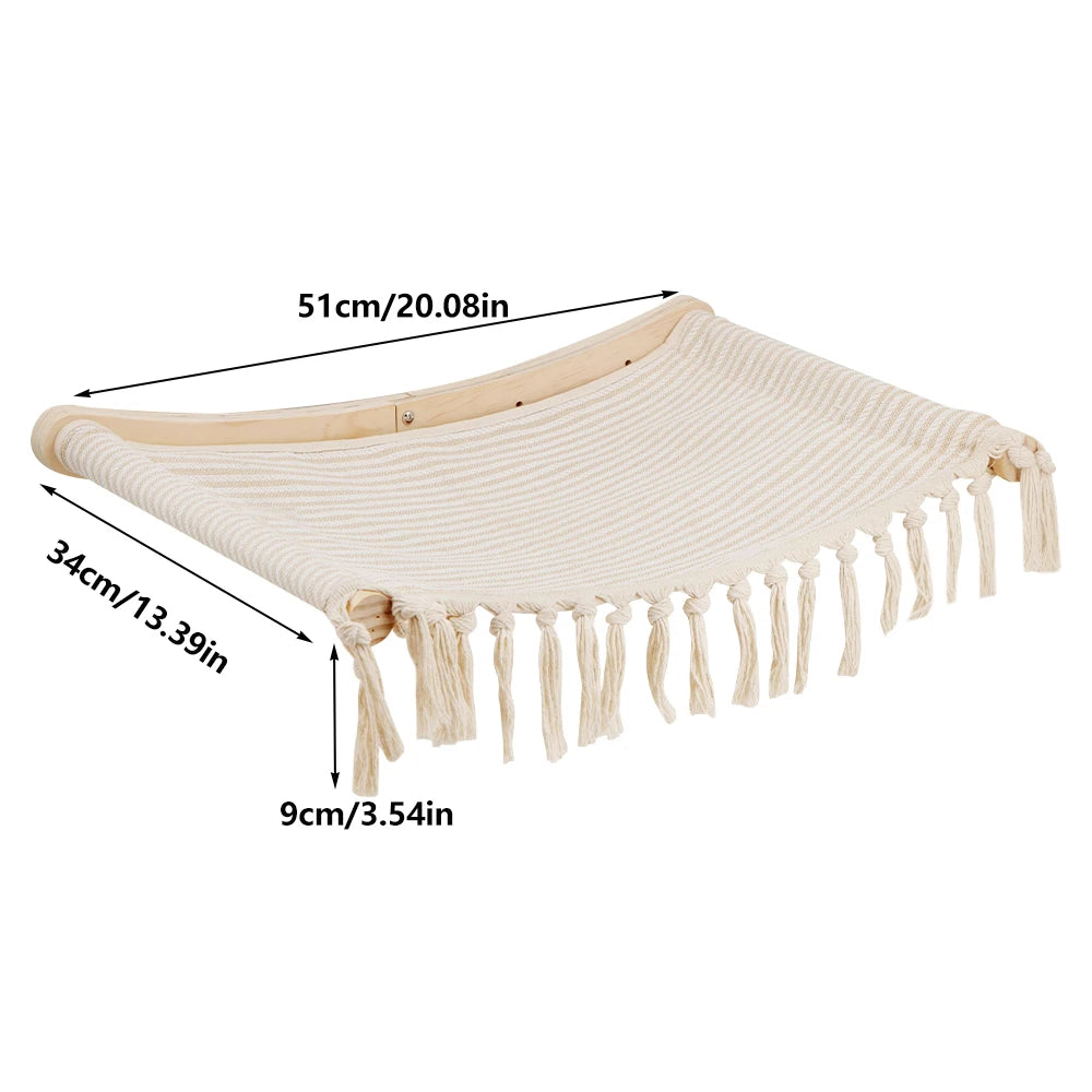 Cream macrame wall hammock on a wooden frame with a knotted fringe, 51 cm (20.08 in) long and 34 cm (13.39 in) wide