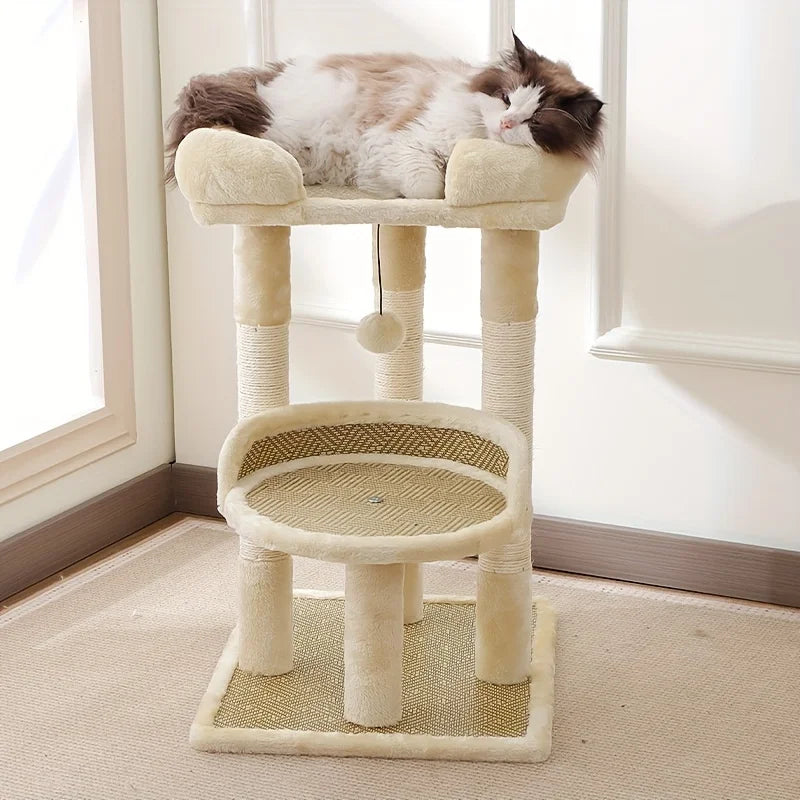 Cream natural cat tree by a white door, a long-haired brown and white cat asleep on the top bed with bolsters