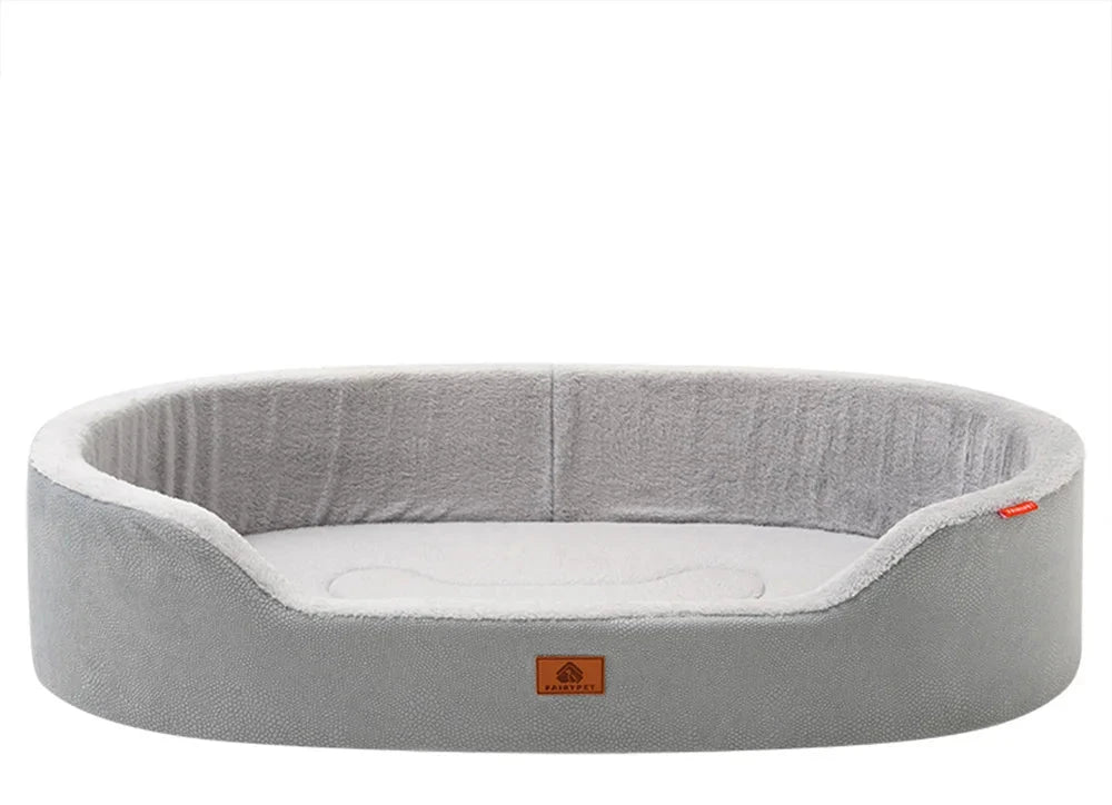 Oval basket dog bed in light grey with a pebble-textured shell and a pale grey plush lining
