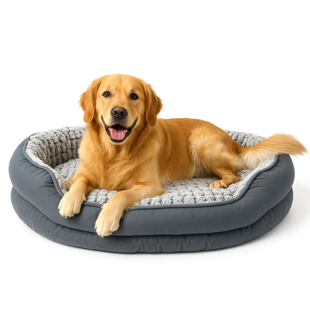Golden retriever lying in a grey oval donut bed with a textured plush lining, paws over the rim