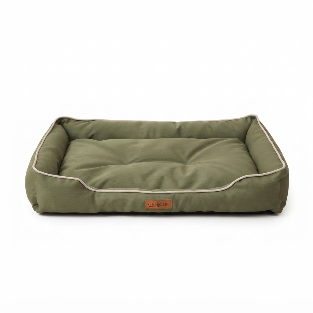 Rectangular Oxford dog bed in olive green with cream piping and a low front edge