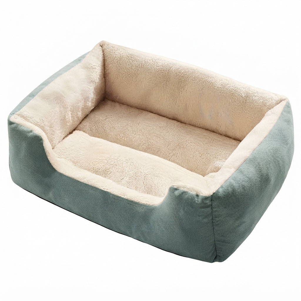 Rectangular puppy dog bed with sage green sides, a deep cream plush lining and a low front edge