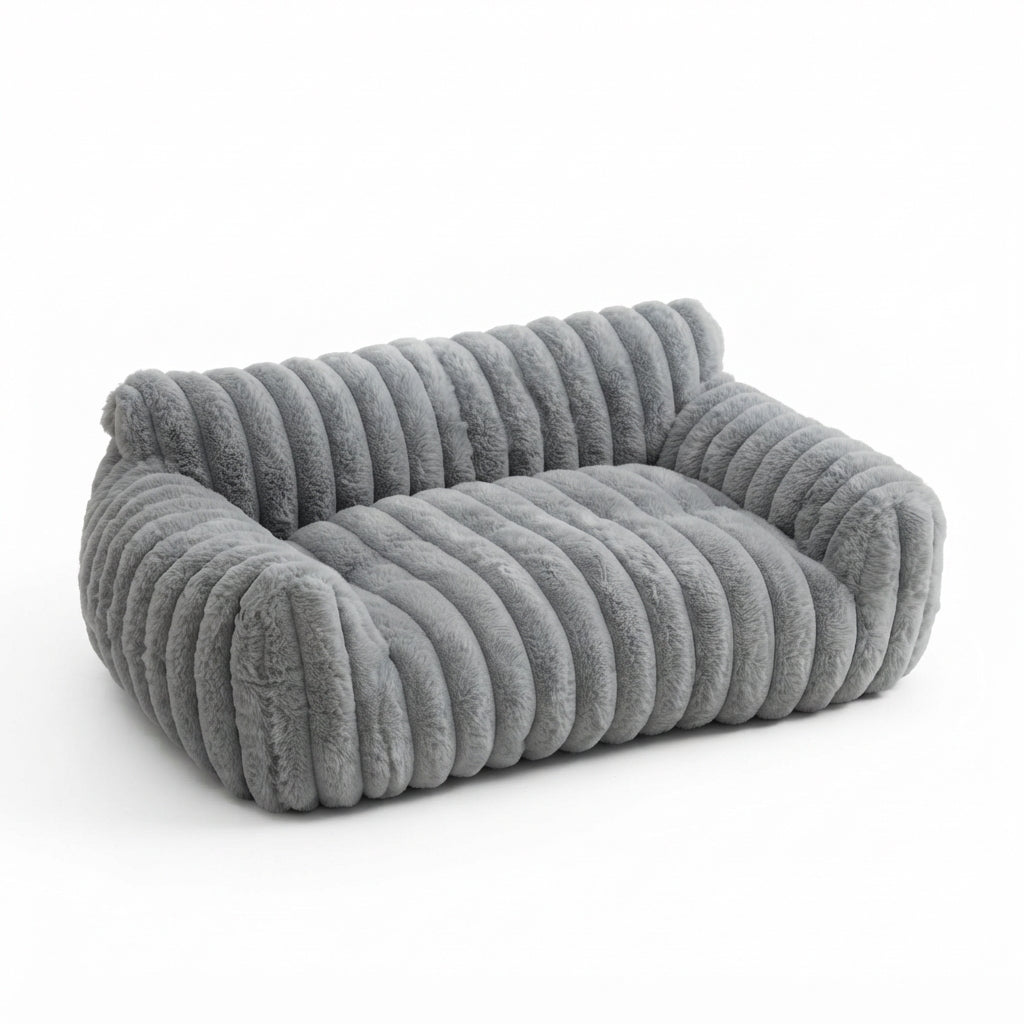 Ribbed cat couch bed in grey plush with channelled padding, a low backrest and rounded armrests