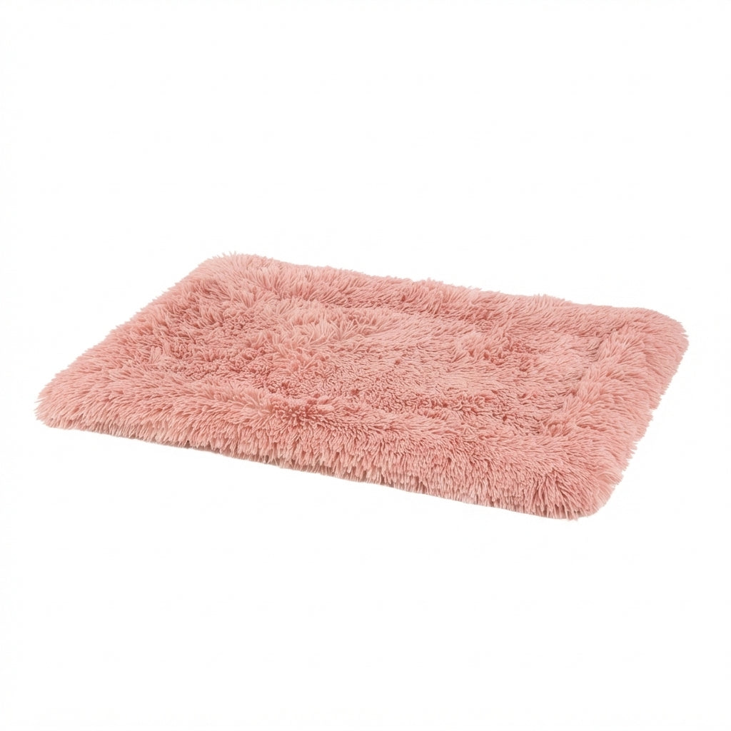 Shaggy dog blanket in pink long-pile plush, a dusty pink rectangle with rounded corners