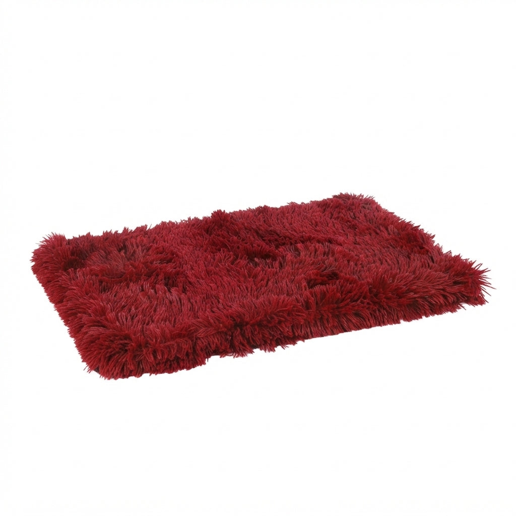 Shaggy dog blanket in wine red long-pile plush, a flat rectangle laid out on a white background