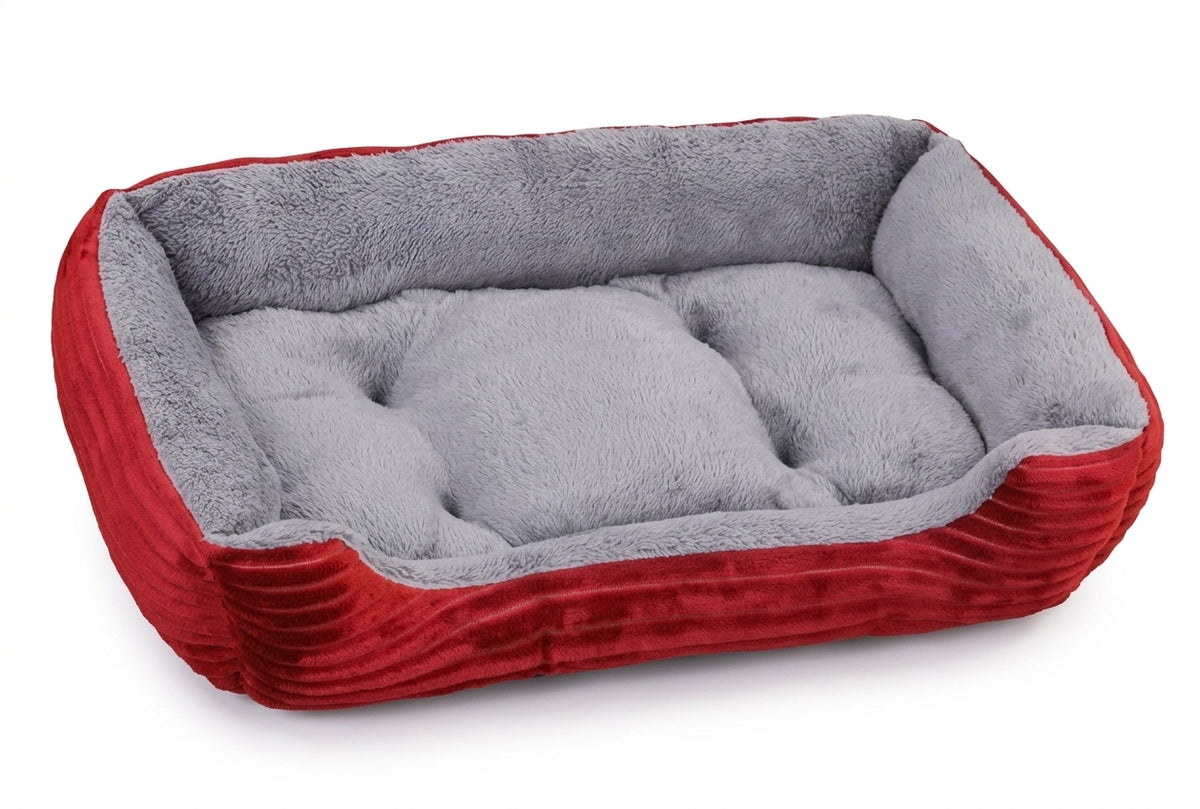 Rectangular dog bed in red corduroy with ribbed red sides and a light grey plush cushion