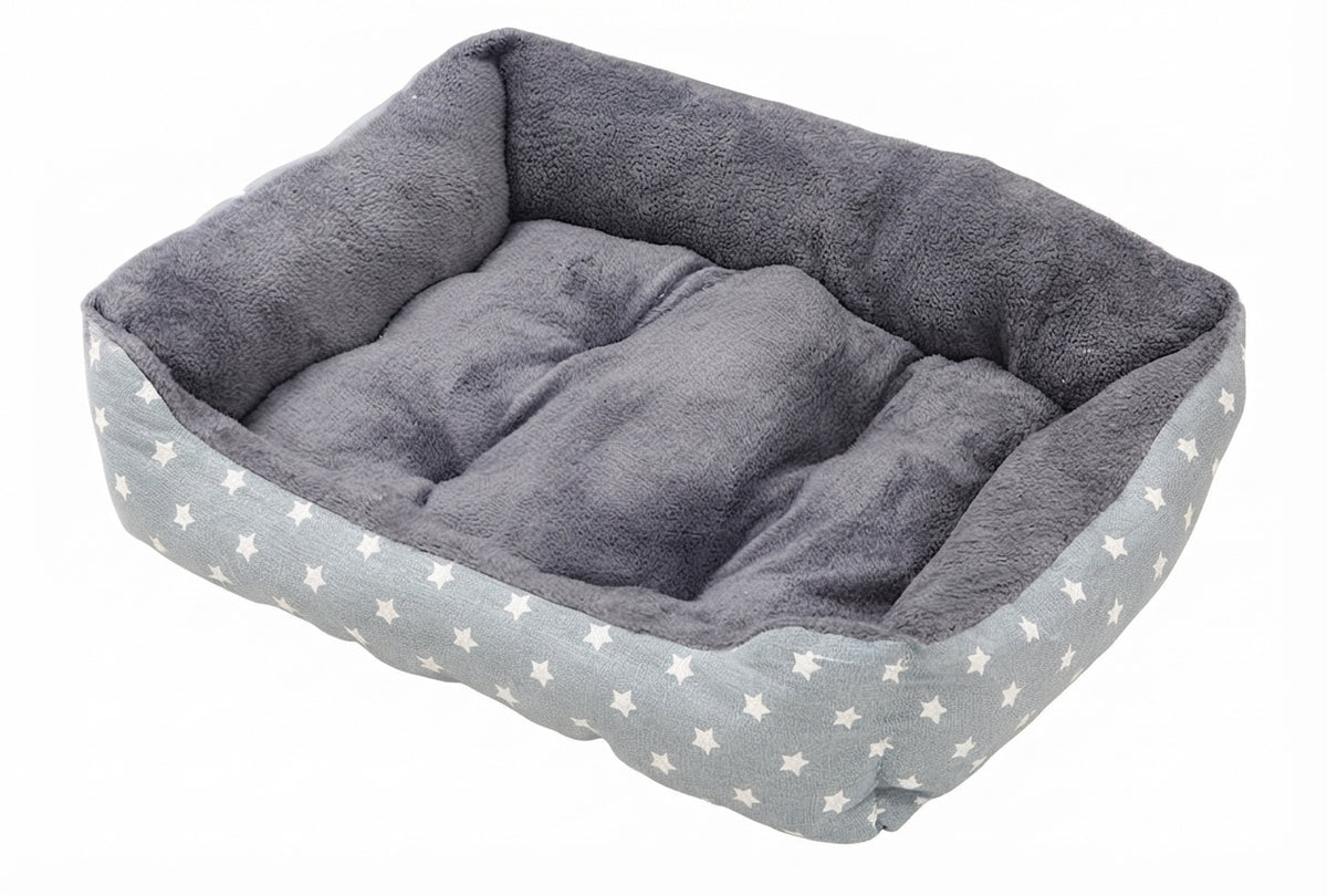 Rectangular soft dog bed in grey stars canvas, small white stars on pale grey sides and a grey plush lining