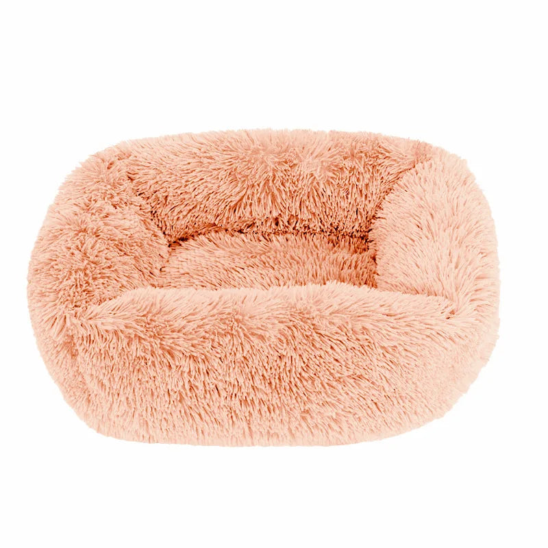 Square dog bed in dark apricot long plush, with high fluffy walls around a padded base