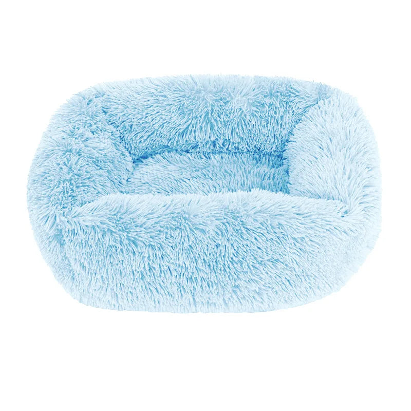 Square dog bed in light blue long plush, with high fluffy walls around a padded base