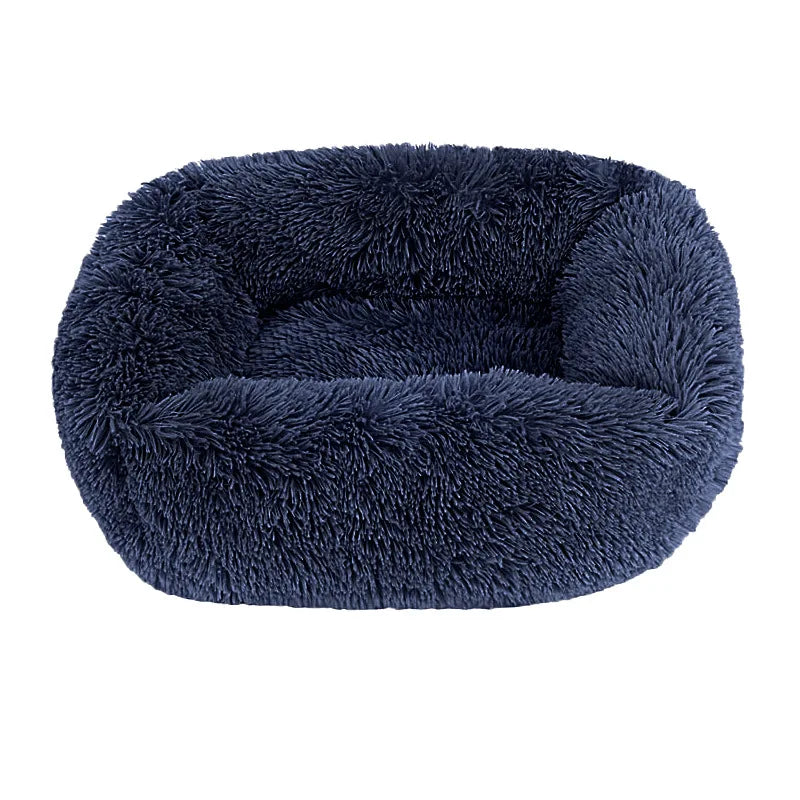 Square dog bed in navy blue long plush, with high fluffy walls around a padded base