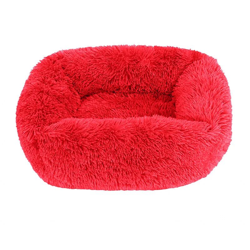 Square dog bed in red long plush, with high fluffy walls around a padded base